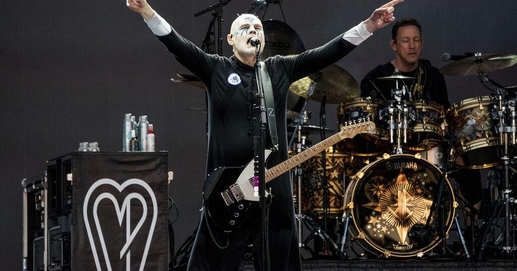 The Smashing Pumpkins performing on tour